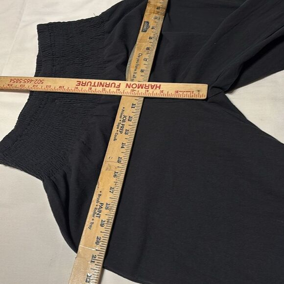 Black Ruffle Hem Wide-Leg Gaucho Pants. Elastic waist and ruffle hemline - Picture 10 of 11